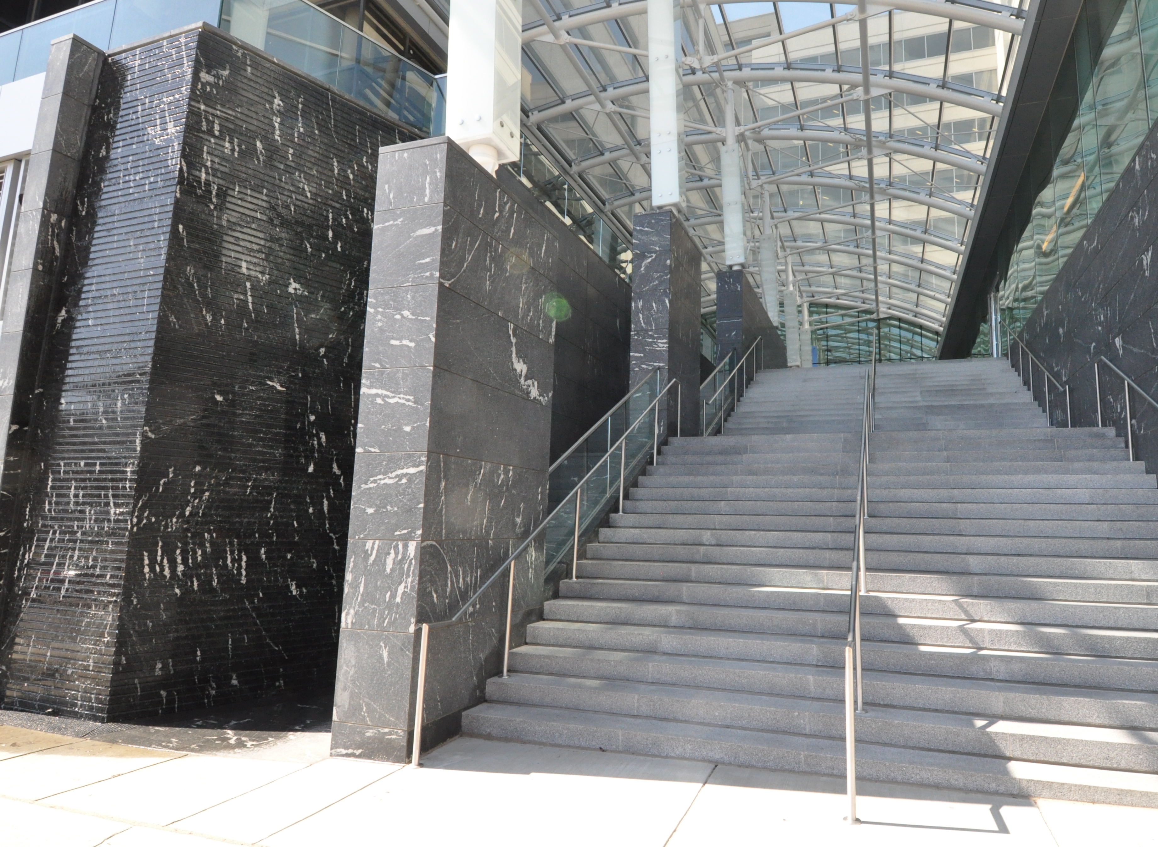 23ft Tall Cut Granite Water Wall, Greensboro Station, McLean, VA. Design by Smith Group JJR.