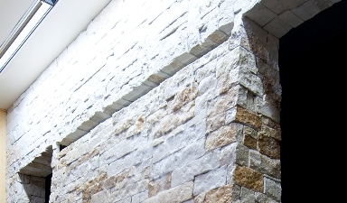 Natural stone water wall flowing into immersion pool, The Hills Church of Christ, North Richmond Hills, TX.