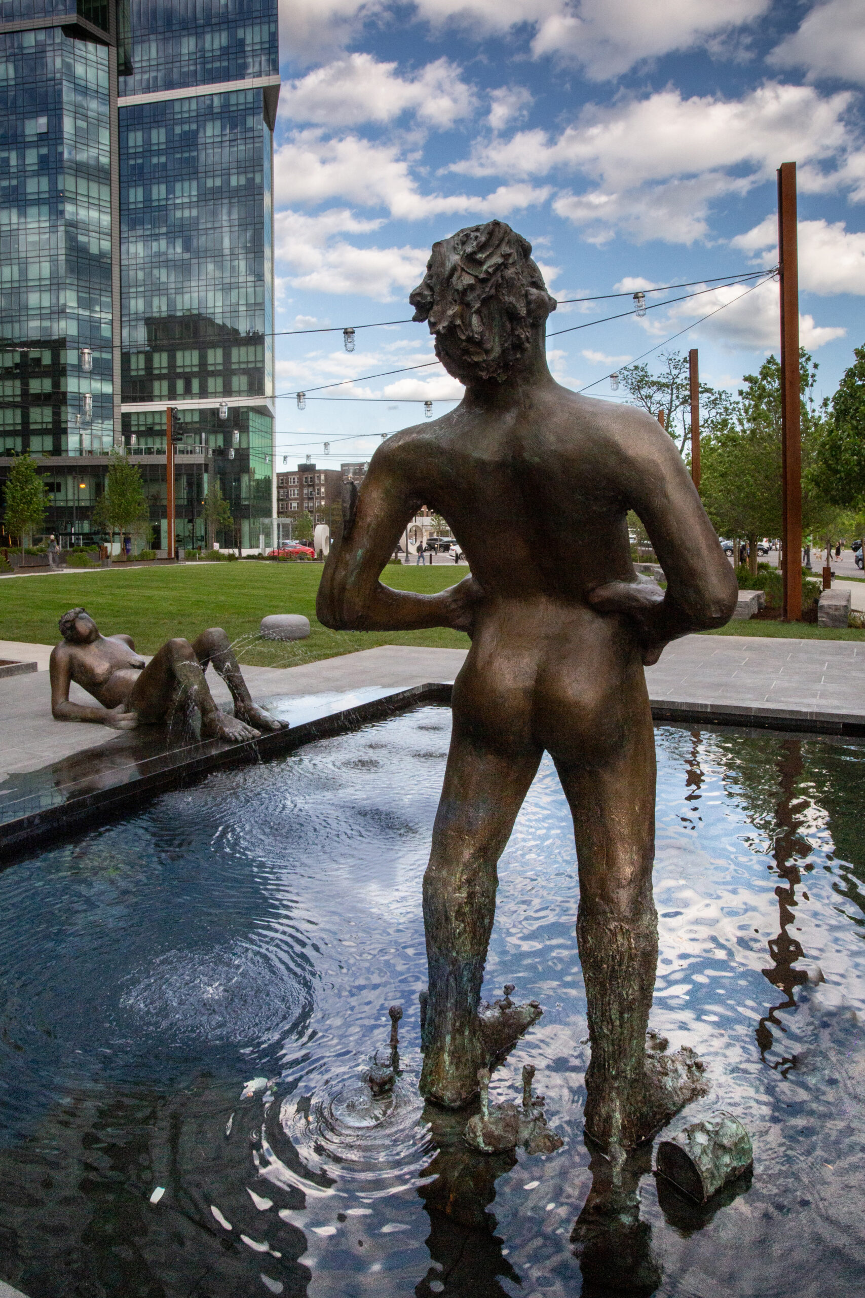 Nicole Eisenman Standing Figure With Misting Water Feature Effect, Landmark Center, Boston, MA. Park Design By Leblanc Jones Landscape Architects.